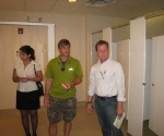 When you visit a plumbing company or plumbing showroom, checking out their own restrooms is a must. Jen Data, J.B. and Paul, with Nora taking the shot. In the men's room.